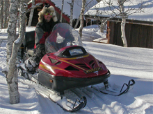 Mann på snøscooter - Copyright: Jostein Sandvik